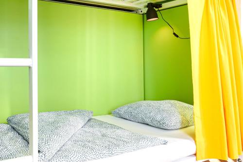 Postel nebo postele na pokoji v ubytování Avenue Hostel