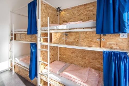 Postel nebo postele na pokoji v ubytování Avenue Hostel