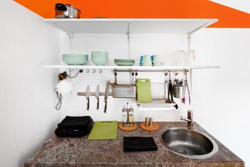 Kuchyň nebo kuchyňský kout v ubytování Avenue Hostel