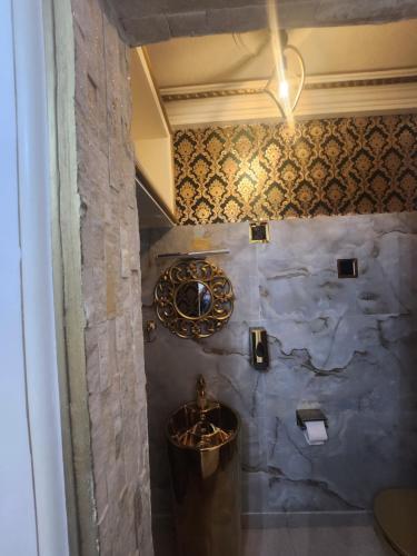 Un baño de Luxueux platinium