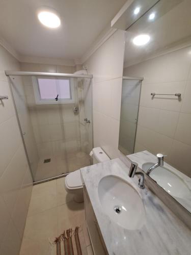 Koupelna v ubytování Apartamento Confortável em Capão