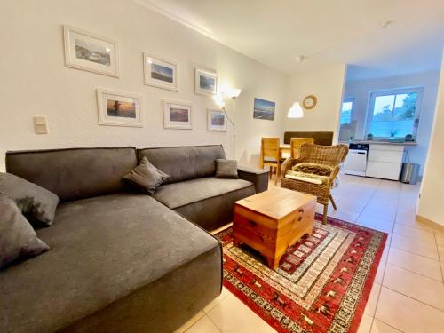 Posezení v ubytování Schöne 3-Zi-Wohnung mit "in-door-pool" an der Promenade direkt am Scharbeutzer Strand