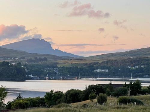 a view of a lake with a mountain in the background at STORR (caravan skye holidays) in Portree