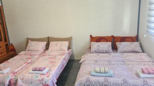 Ліжко або ліжка в номері Apartman Kujovic