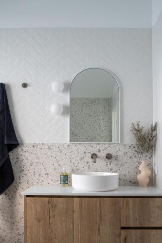 a bathroom with a sink and a mirror at The McKinlay Echuca in Echuca