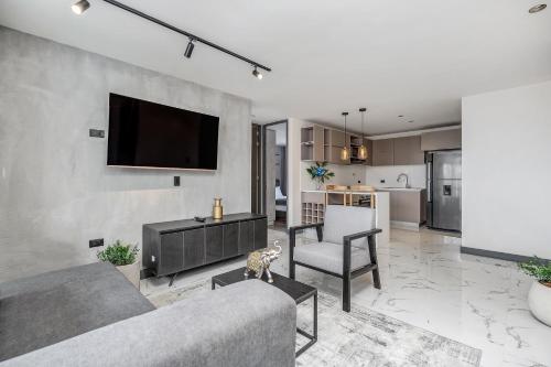 Apartamentos HOUSY Laurelesにあるキッチンまたは簡易キッチン