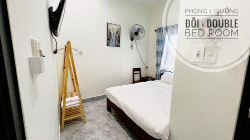 Postel nebo postele na pokoji v ubytování Mini hotel Lạc Hồng