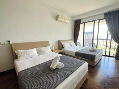 Postel nebo postele na pokoji v ubytování Landmark Stunning High Floor Coast View Studio #Netflix #Fast Wifi