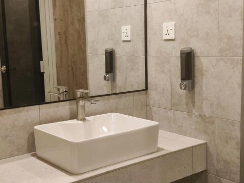 Koupelna v ubytování ZOOM HOTEL