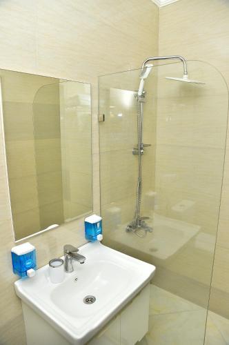 Ванная комната в Boulevard Rigs Boutique Hotel