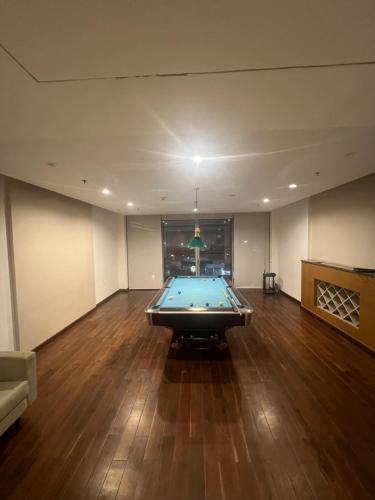 a large room with a pool table in it at Luxury Studios Key 1 in Gurgaon