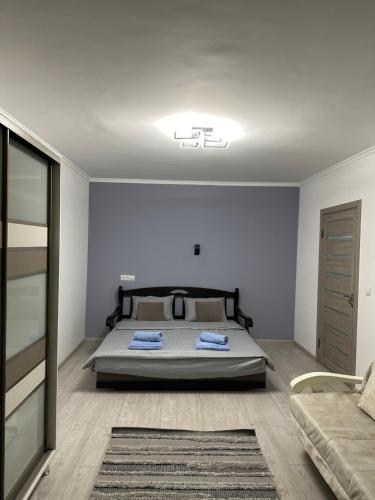 Krevet ili kreveti u jedinici u objektu Gray Apartment
