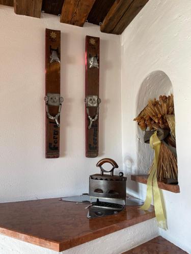 a kitchen with a stove and a mortar and pestle at Select Apartment Top 13by Alpina in Piesendorf