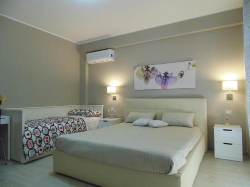 Posteľ alebo postele v izbe v ubytovaní Attico Del Sole
