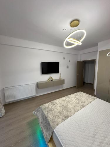 Ένα ή περισσότερα κρεβάτια σε δωμάτιο στο Agi’s Apartment Predeal