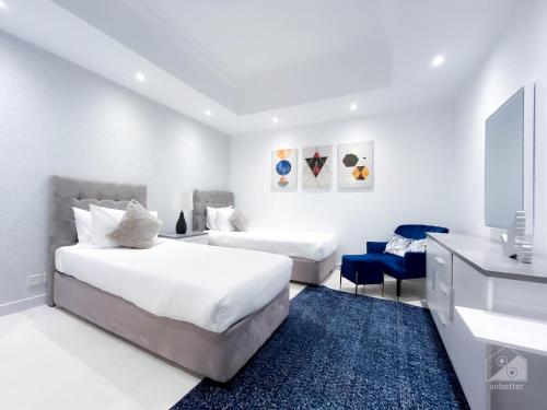 Postel nebo postele na pokoji v ubytování Bright & Spacious 2Bedroom in Dubai Marina