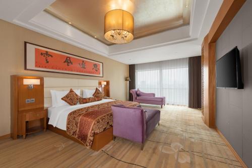Μια τηλεόραση ή/και κέντρο ψυχαγωγίας στο Wyndham Putian Downtown