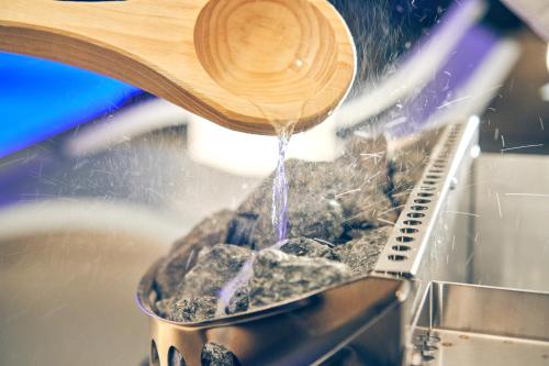 a stream of water being poured into a fountain at ルクス箱根湯本 LUX HAKONE YUMOTO in Hakone