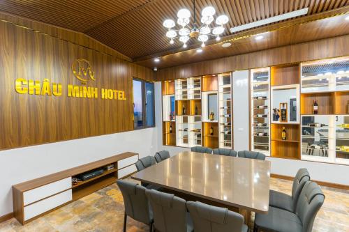 a dining room with a table and chairs at CM Hotel & Apartment in Hai Phong