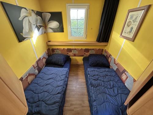 Postel nebo postele na pokoji v ubytování Beach Resort Kamperland - 164