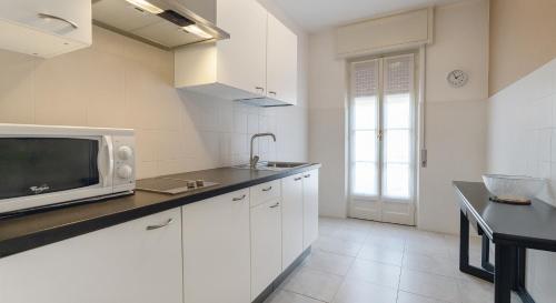 Kuchyň nebo kuchyňský kout v ubytování Residenza dei Fiori