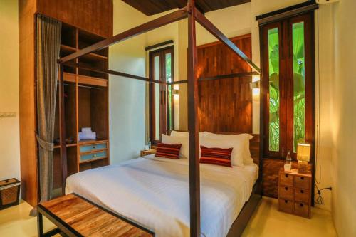 Katil atau katil-katil dalam bilik di Puripai Villa Wellness & Retreat