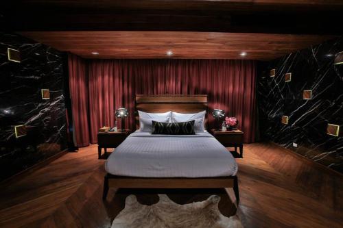Katil atau katil-katil dalam bilik di Puripai Villa Wellness & Retreat