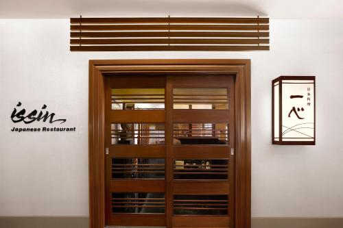 a wooden door in front of a building at The Westin Resort Guam in Tumon