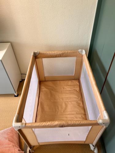 a small bed frame in a room at 白浜バケーションレンタル　SVR in Shirahama