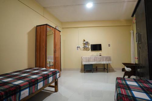 Μια τηλεόραση ή/και κέντρο ψυχαγωγίας στο AI Homestay Nongstoin