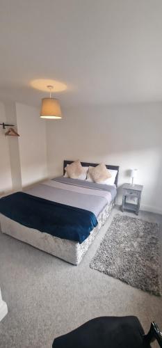 Letto o letti in una camera di Cosy Fresh New Refurbished House