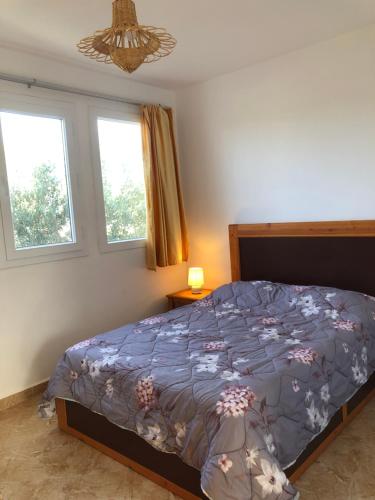 Postel nebo postele na pokoji v ubytování Camping la palmeraie Tifnit