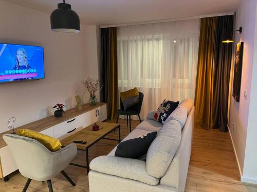 Et tv og/eller underholdning på Apartament Suceava