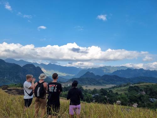 a group of people standing on top of a hill at Inh La Home Pu Luong in Pu Luong