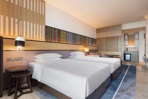 Кровать или кровати в номере Hyatt Regency Sanya Tianli Bay