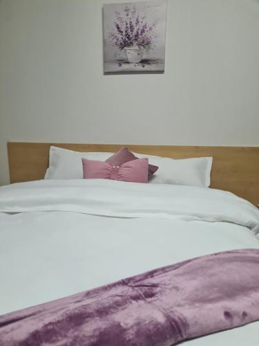 Postel nebo postele na pokoji v ubytování Pastello guest house