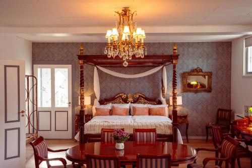 Кровать или кровати в номере Boutique Hotel Postgården