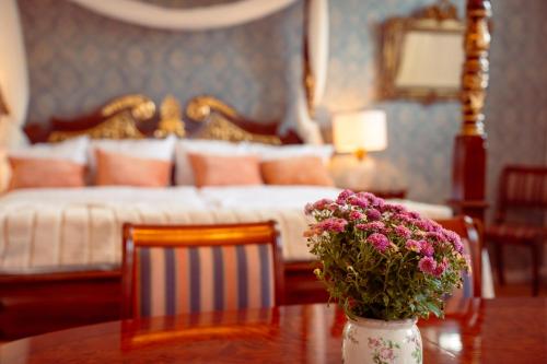 Кровать или кровати в номере Boutique Hotel Postgården