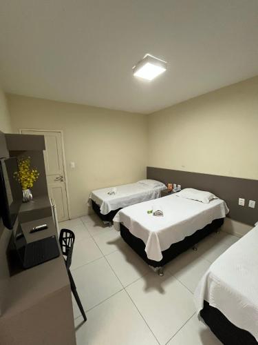 Postel nebo postele na pokoji v ubytování SD Plaza Hotel