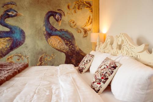Кровать или кровати в номере Boutique Hotel Postgården
