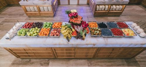 a display of fruits and vegetables on a counter at Posthotel Achenkirch Resort and Spa - Adults Only in Achenkirch
