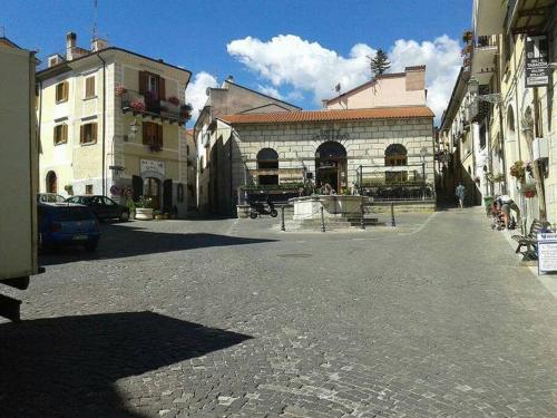 an empty street in a city with buildings at Casa San Francesco in Agnone