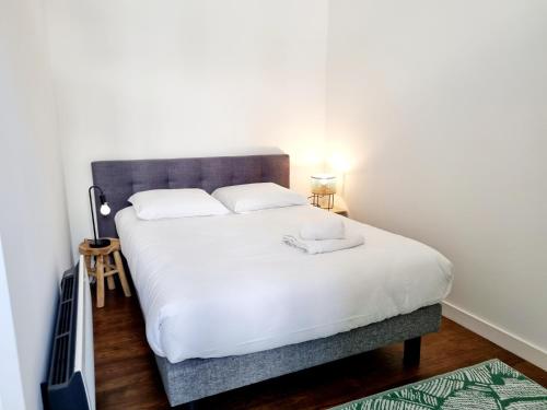 Postel nebo postele na pokoji v ubytování Plateau d'Angoulême proche bus et commerces