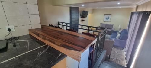 Χώρος καθιστικού στο The Highlander Hotel Dullstroom