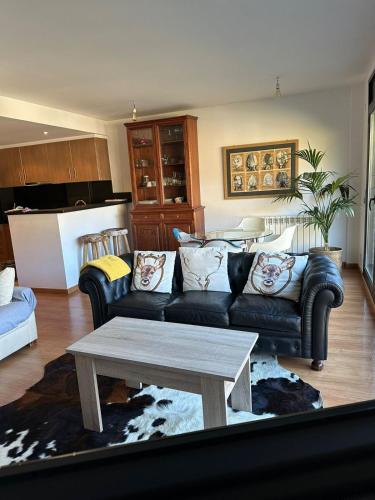 a living room with a couch and a table at Appartement au coeur d'Ordino HUT7872 in Ordino