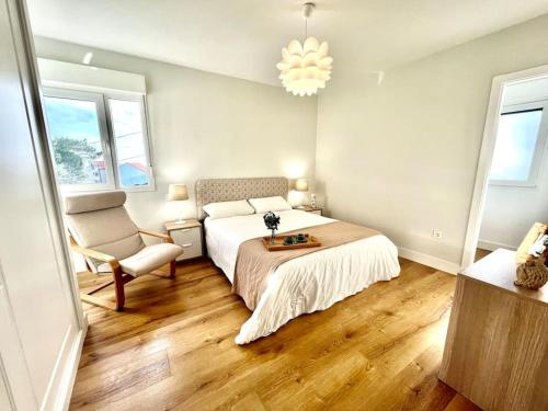 En eller flere senge i et værelse på Casa en la playa