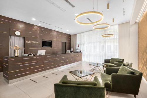 TV a/nebo společenská místnost v ubytování Corso Hotel Pécs