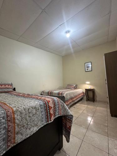 Voodi või voodid majutusasutuse Casa de Campo en Salcoatitan toas