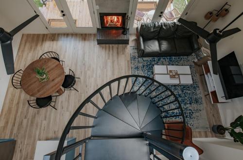 an overhead view of a spiral staircase with a table at Tranquille Resort in Hiawassee