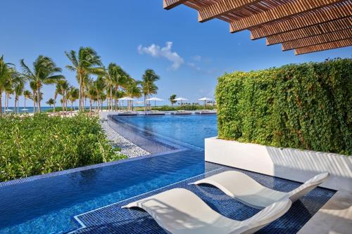 Bazén v ubytování The St. Regis Kanai Resort, Riviera Maya nebo v jeho okolí
